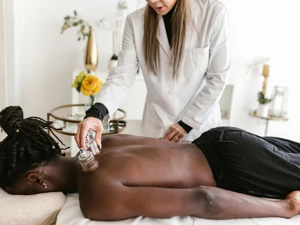 A practitioner providing a focused treatment