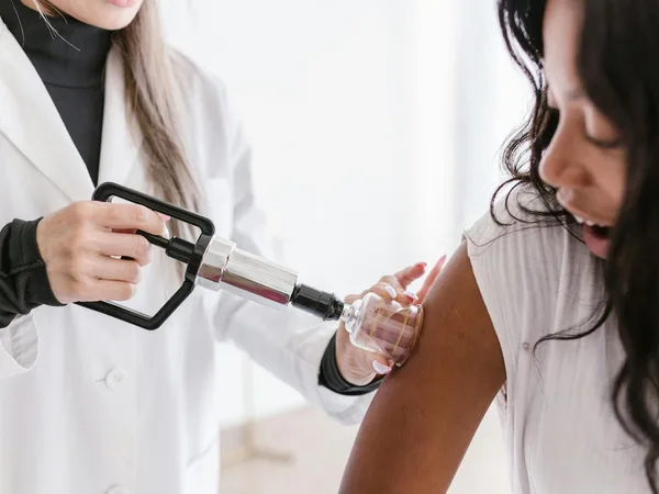 A practitioner providing a focused treatment